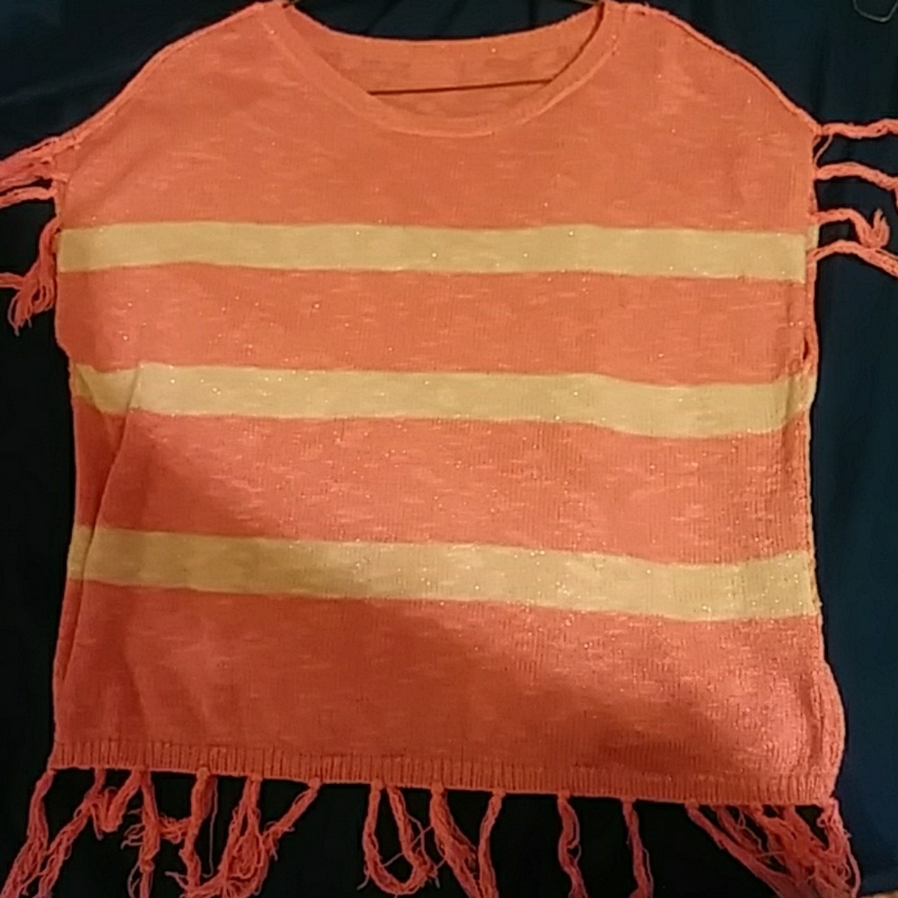 Pink n white justice shirt.